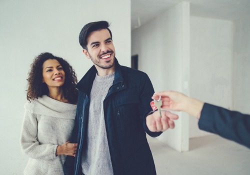 Couple Receiving Keys to Rental Apartments in Peoria IL