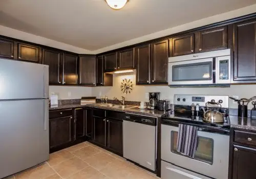 Photo of a beautiful kitchen with all new appliances in an apartment for rent.